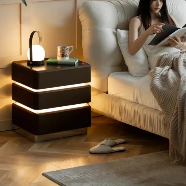 Modern smart bedside table with LED lighting, wireless charging, and storage drawers.