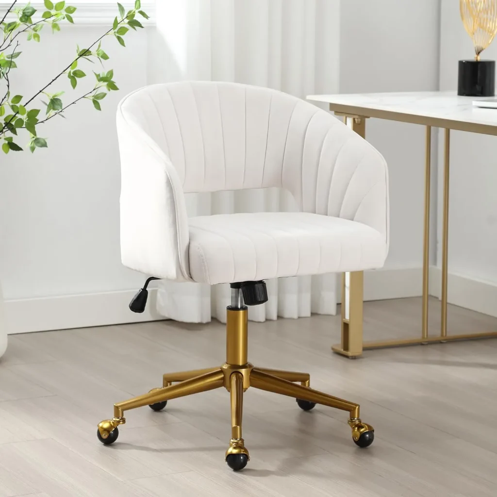 Luxury velvet upholstered swivel office chair with gold base for stylish workspaces.